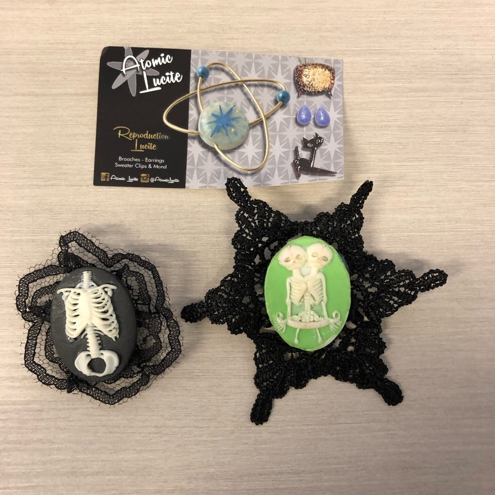 2 Atomic Lucite Creepy Brooches